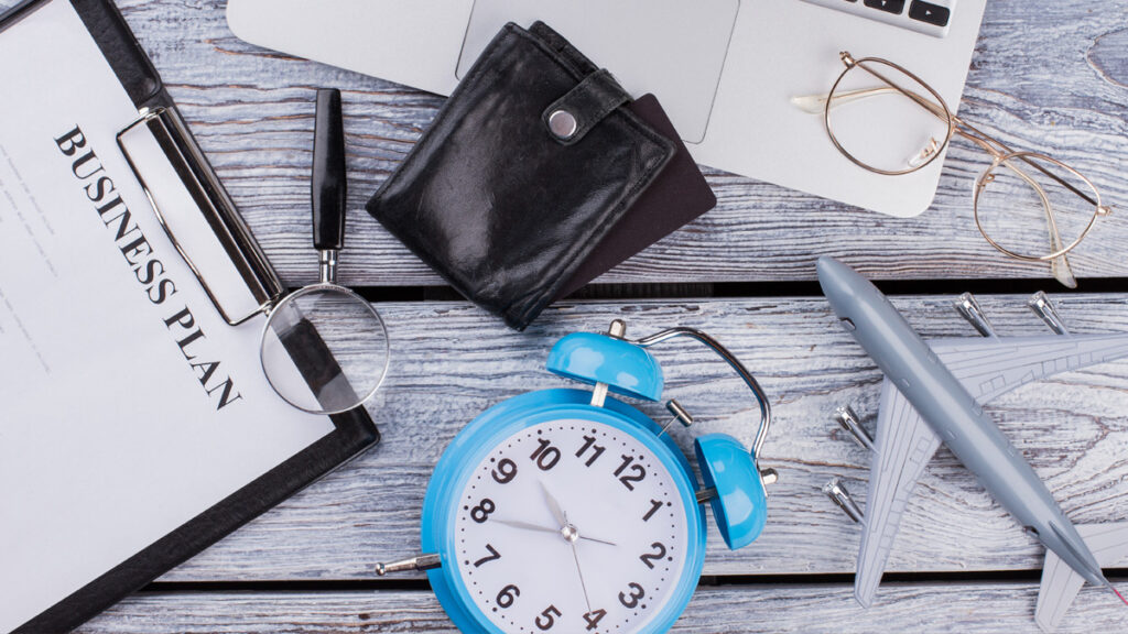 Rich businessman accessories on wooden table
